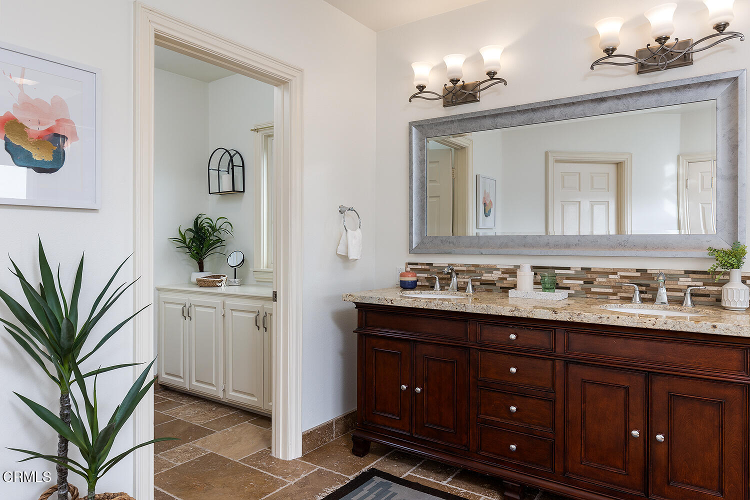 1386 Glen Oaks Boulevard Pasadena, CA 91105 - Photo 35 of 47 a bathroom with a granite countertop sink a mirror and a potted plant