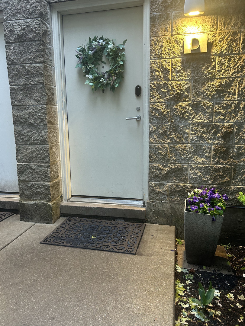 2828 North Talman Avenue, Unit D Chicago, IL 60618 - Photo 4 of 4 a view of a entryway door of the house