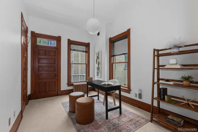 a livingroom with furniture and window