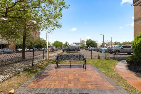 a view of a backyard with sitting area