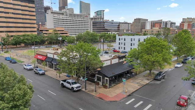 a view of a city with tall buildings