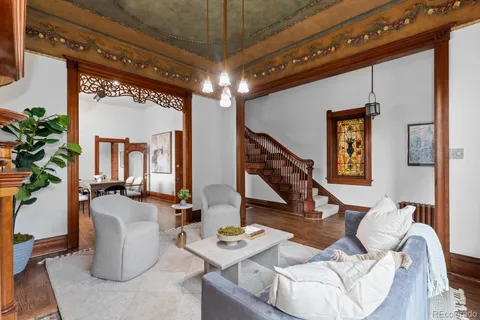 a view of a livingroom with furniture and window