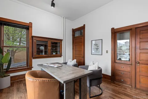 a living room with furniture and window