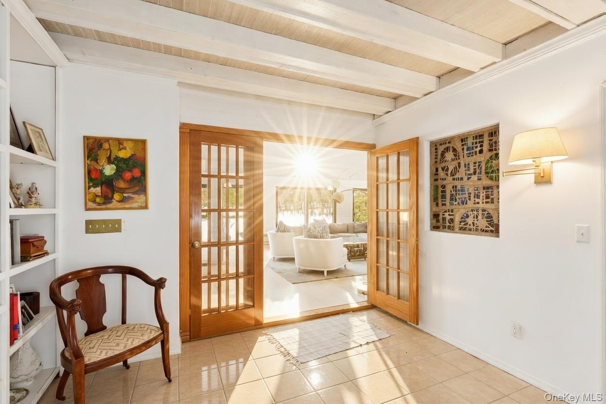 29 Huntting Road East Hampton, NY 11937 - Photo 12 of 29 a view of a livingroom with furniture and front door