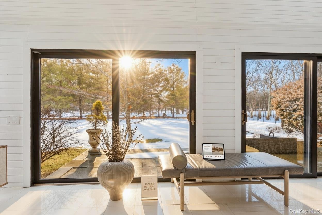 29 Huntting Road East Hampton, NY 11937 - Photo 8 of 29 a view of a dining room with furniture and window