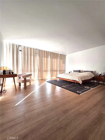 a bathroom with a bathtub and a sink