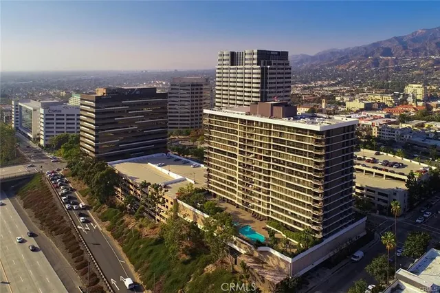 a view of a city with tall buildings