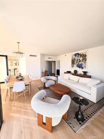 a kitchen with stainless steel appliances a stove sink and cabinets