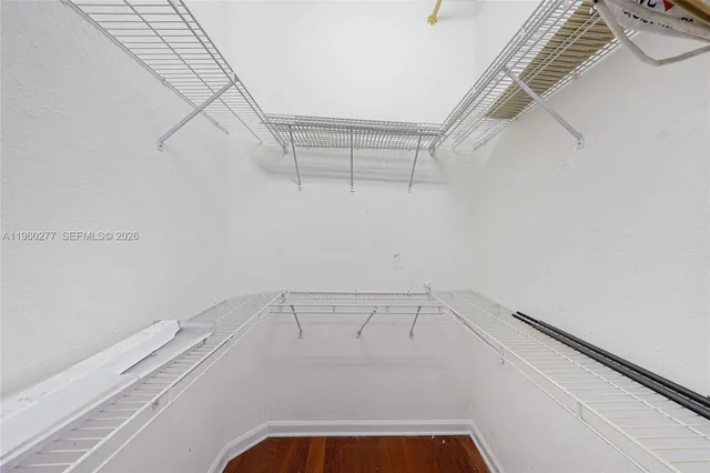 a view of a room with racks on the wall
