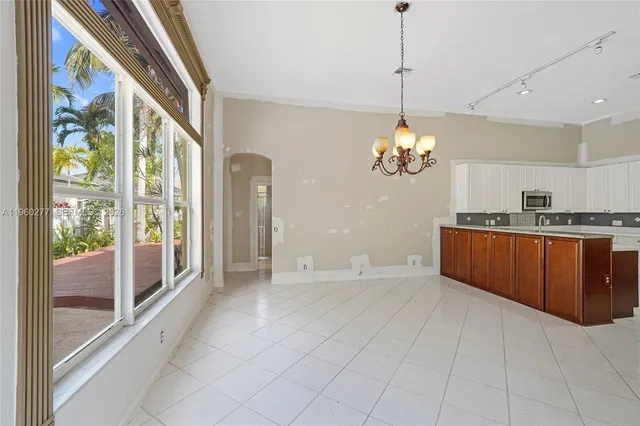 a view of a room with a chandelier