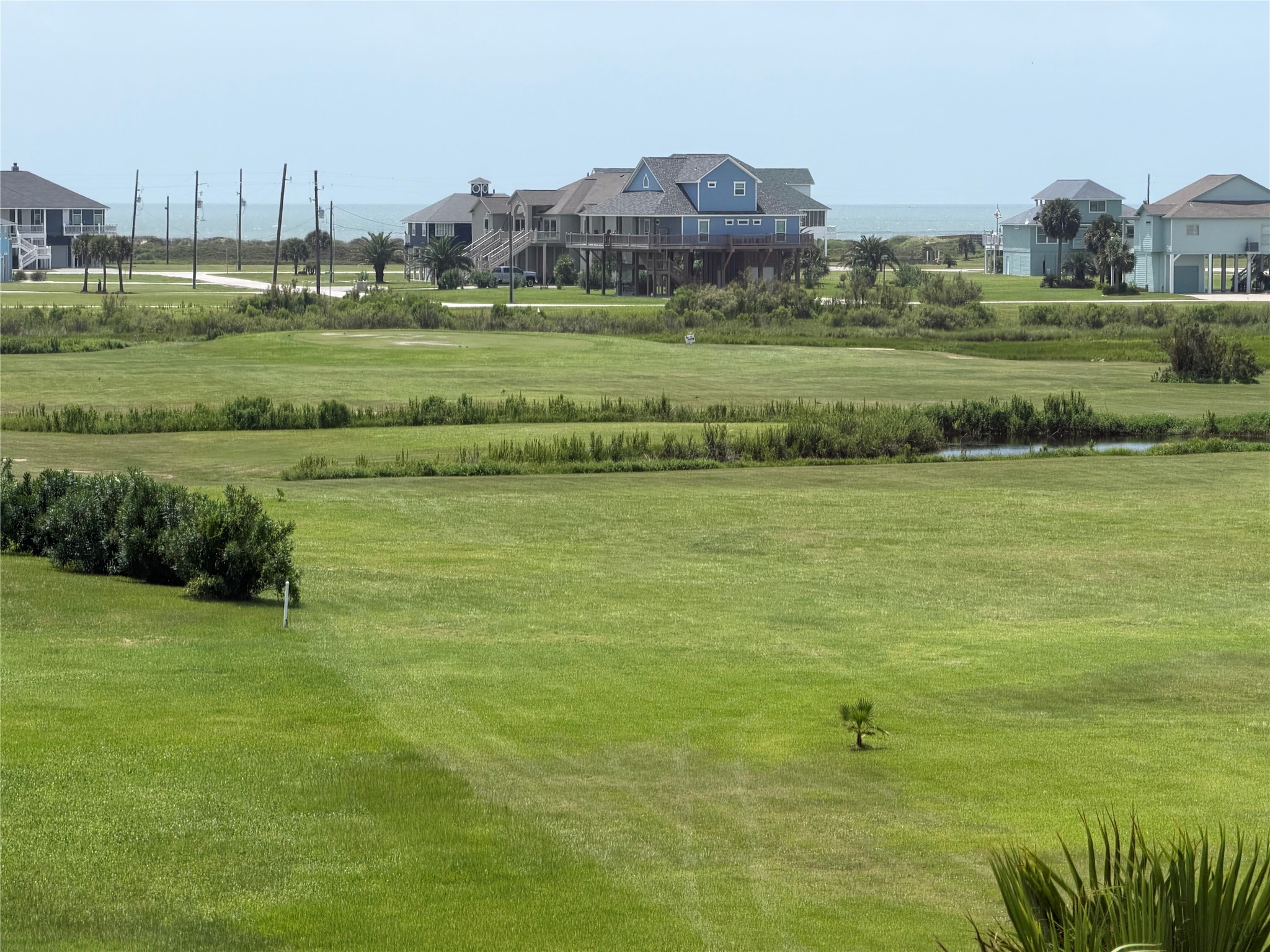 979 Rancho Carribe Drive Crystal Beach, TX 77650 - Photo 48 of 50 View from second floor window towards the Gulf