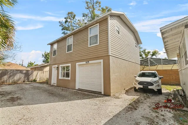 a view of a house with a patio