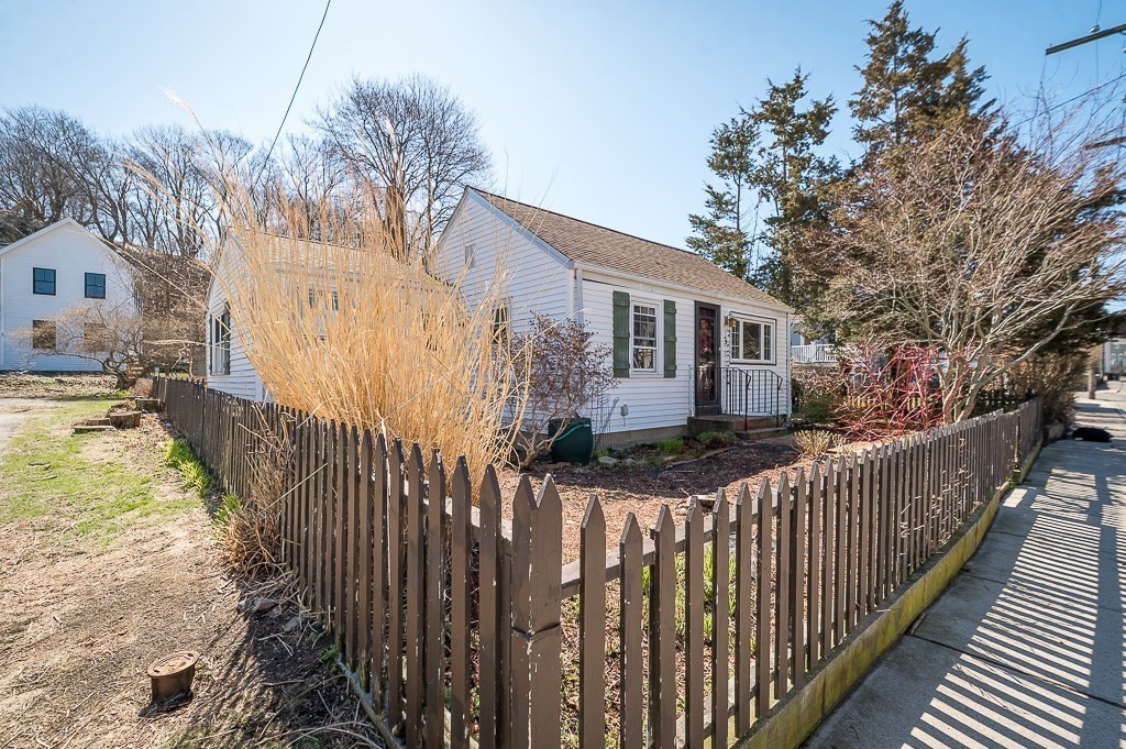3 Davis St Extension Gloucester, MA 01930 - Photo 11 of 29 a view of house with wooden fence