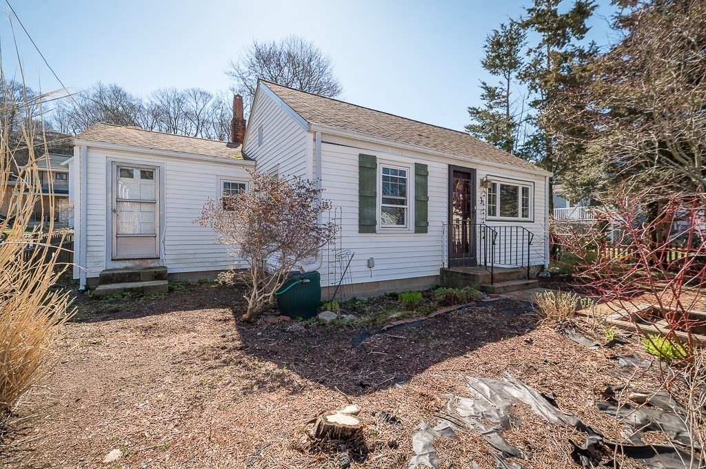 3 Davis St Extension Gloucester, MA 01930 - Photo 12 of 29 a view of a house with a yard