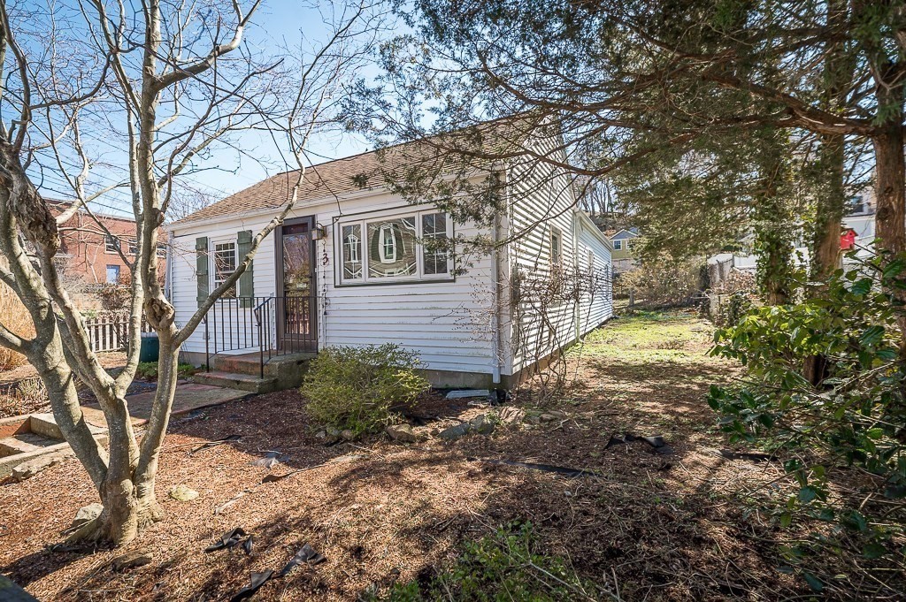 3 Davis St Extension Gloucester, MA 01930 - Photo 13 of 29 a front view of a house with garden