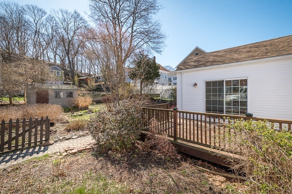 3 Davis St Extension Gloucester, MA 01930 - Photo 20 of 29 a view of a house with a yard