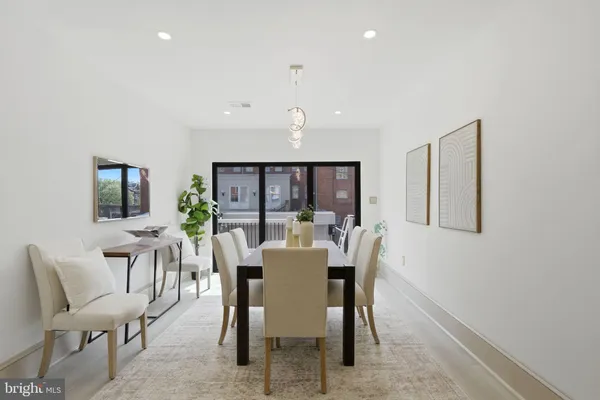 a view of a dining room with furniture
