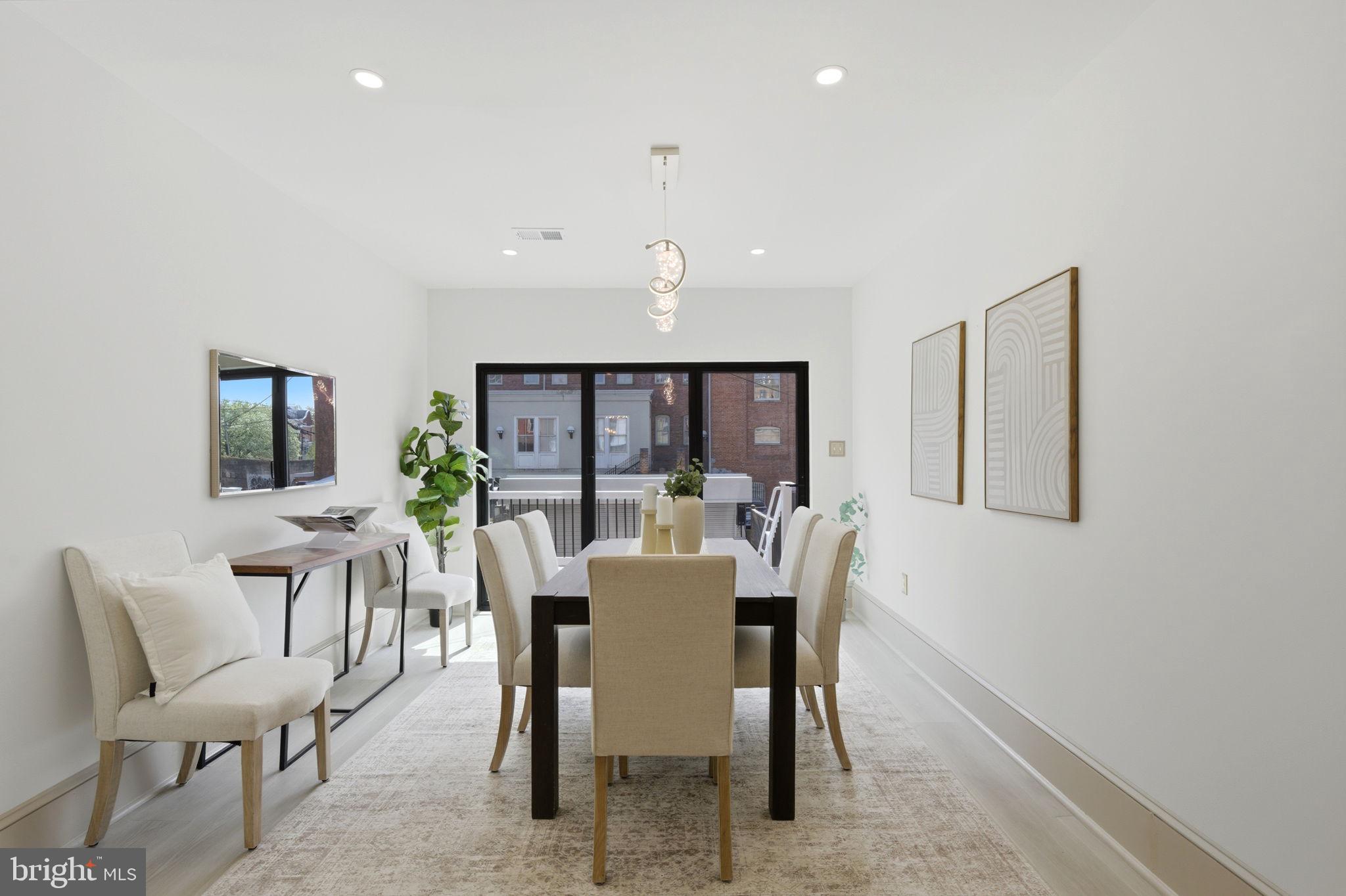 1210 T Street Northwest Washington, DC 20009 - Photo 15 of 41 a view of a dining room with furniture