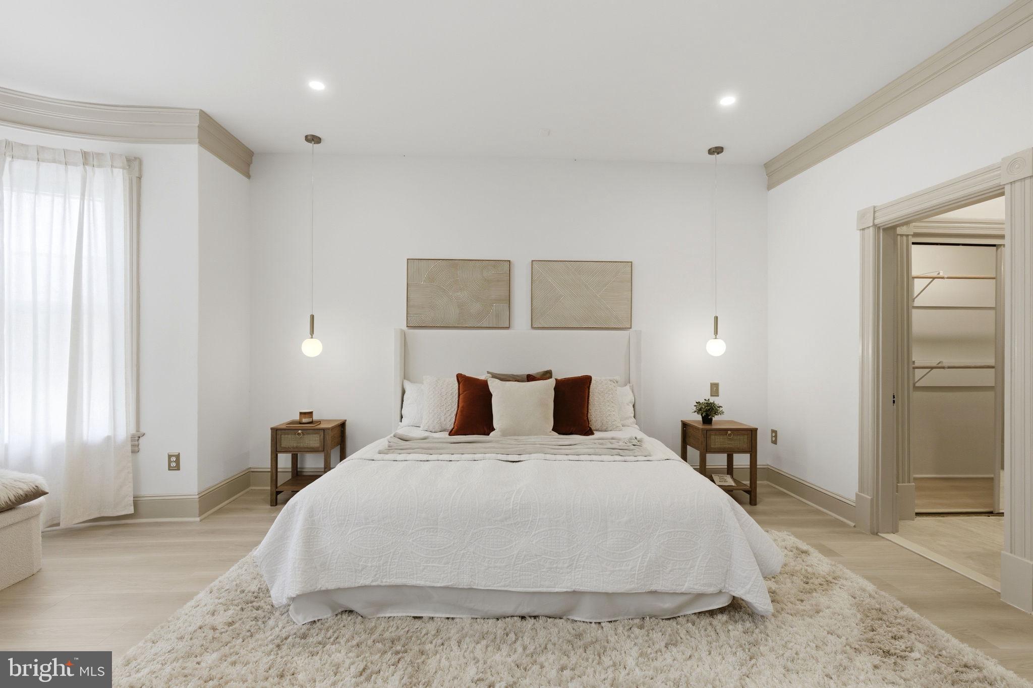 1210 T Street Northwest Washington, DC 20009 - Photo 20 of 41 a bedroom with a bed and a couch