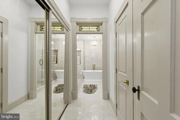 a bathroom with a granite countertop shower