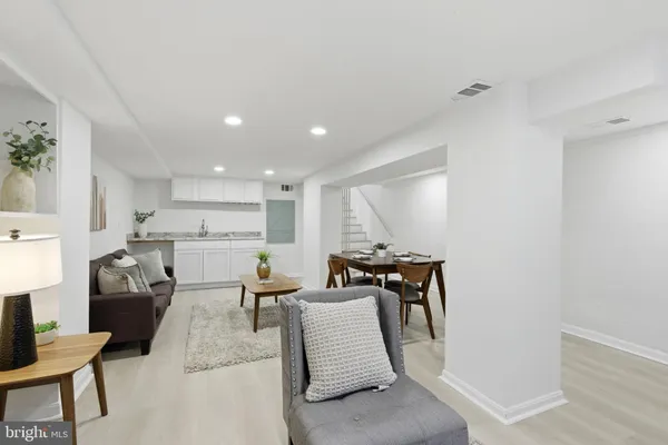 a living room with furniture and a table