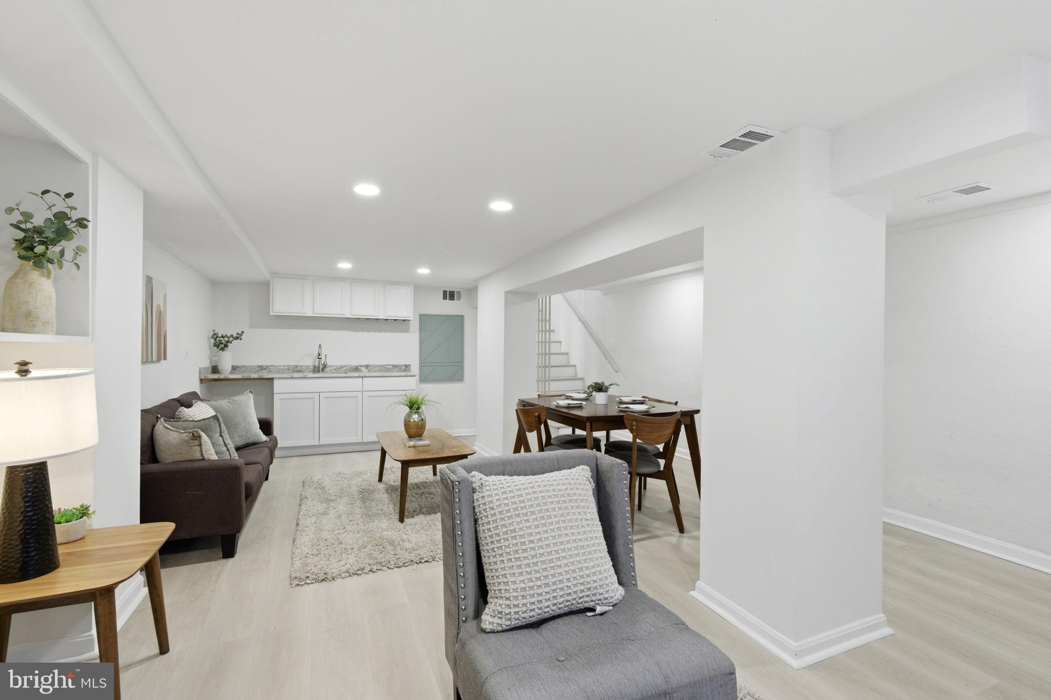 1210 T Street Northwest Washington, DC 20009 - Photo 36 of 41 a living room with furniture and a table