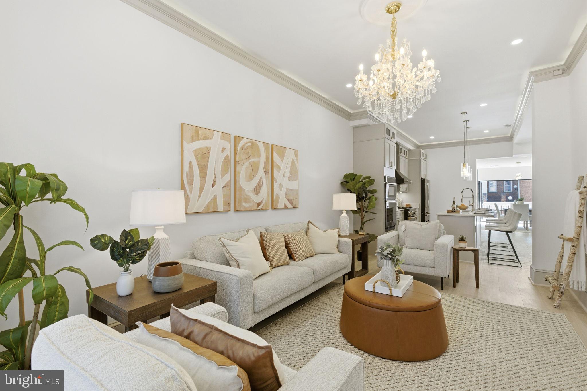 1210 T Street Northwest Washington, DC 20009 - Photo 5 of 41 a living room with furniture and a chandelier