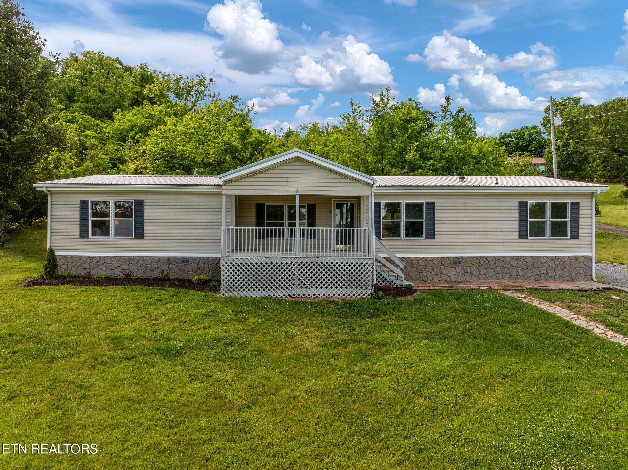 3315 Chuckey Highway Limestone, TN 37681 - Photo 1 of 40 a view of a house with a yard