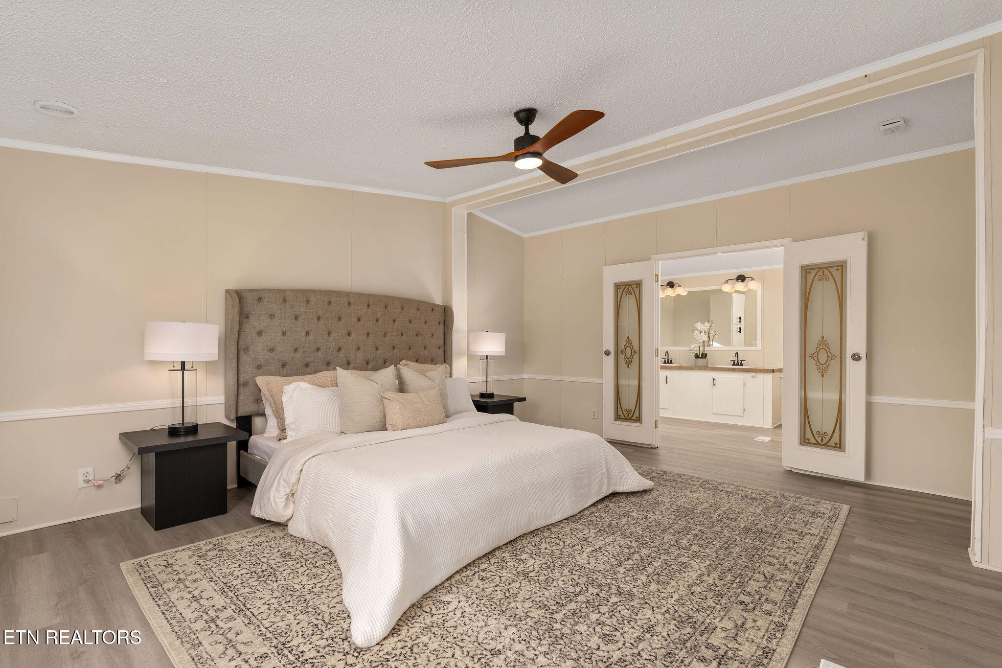 3315 Chuckey Highway Limestone, TN 37681 - Photo 26 of 40 a bedroom with a large bed and wooden floor