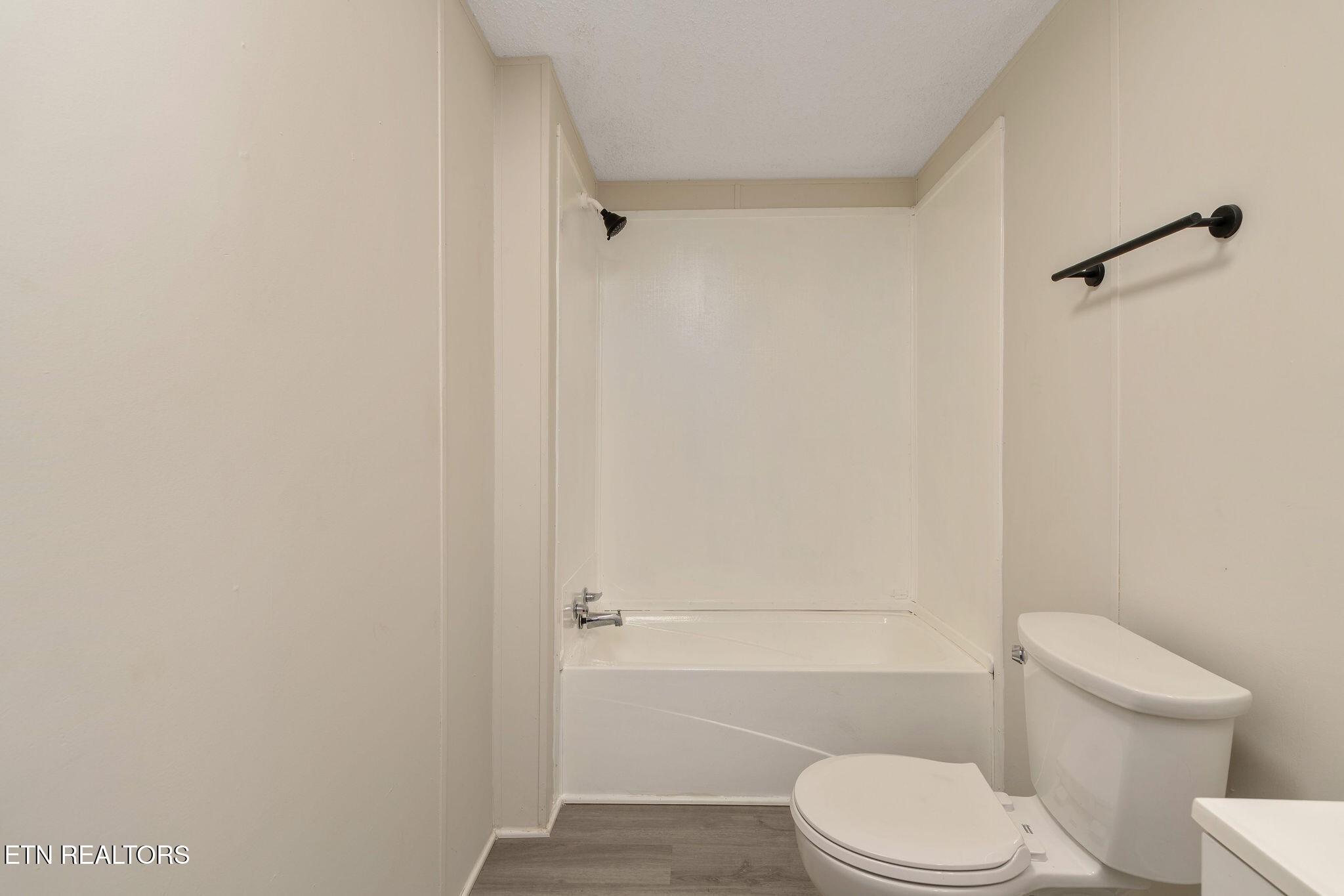 3315 Chuckey Highway Limestone, TN 37681 - Photo 33 of 40 a white toilet sitting next to a bathroom sink