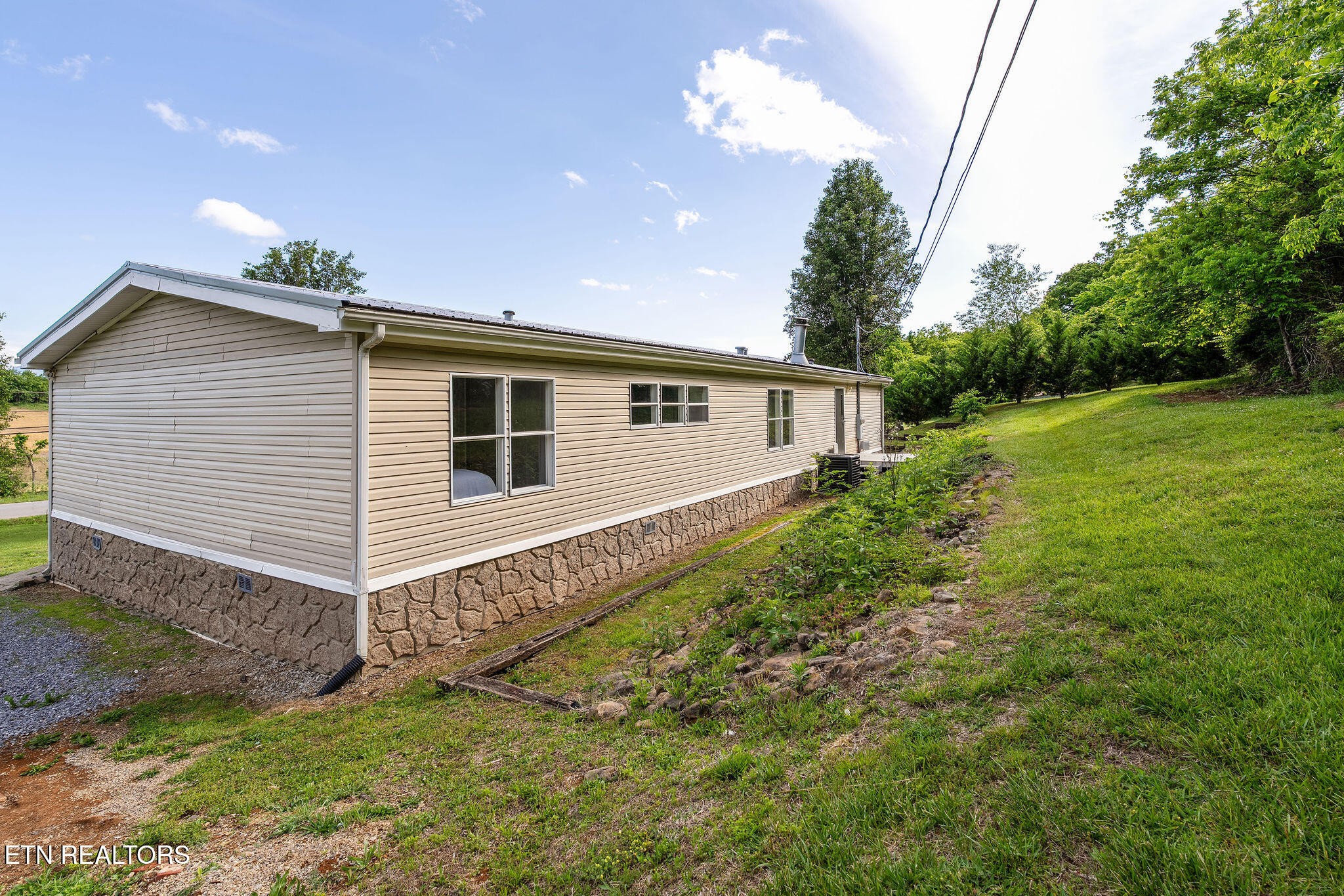 3315 Chuckey Highway Limestone, TN 37681 - Photo 35 of 40 a view of a house with a yard