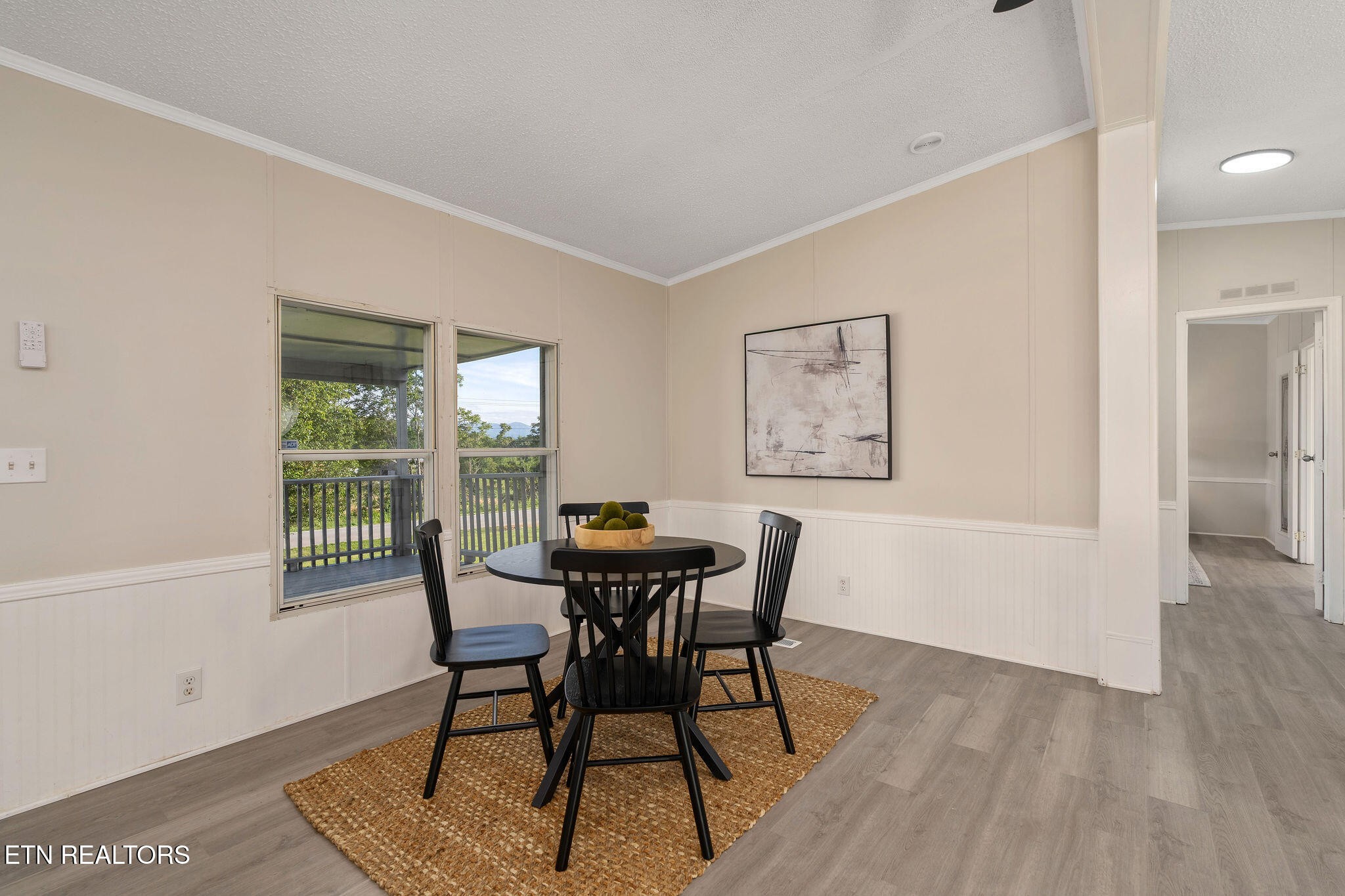 3315 Chuckey Highway Limestone, TN 37681 - Photo 7 of 40 a view of a dining room with furniture window and wooden floor