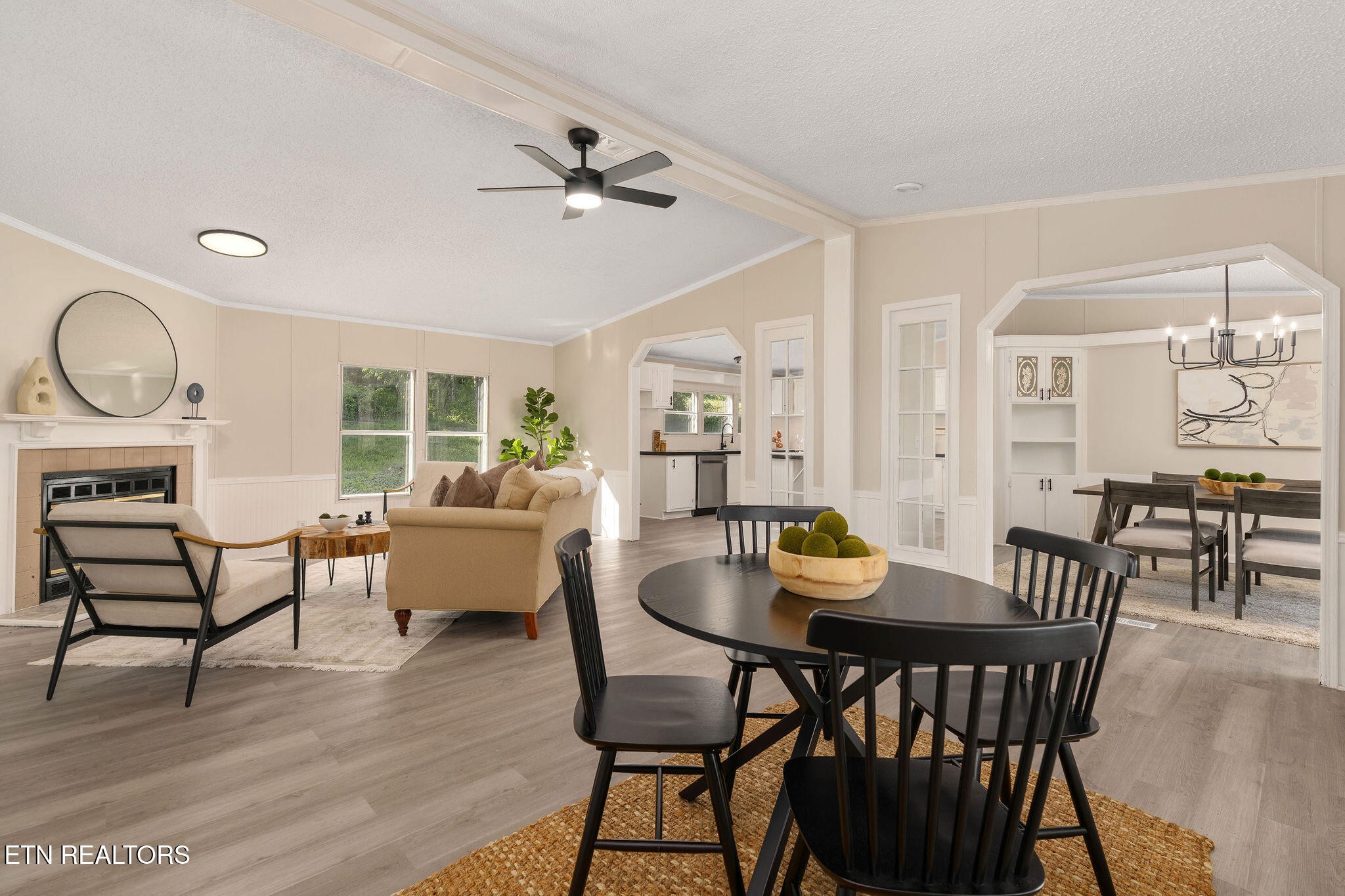 3315 Chuckey Highway Limestone, TN 37681 - Photo 8 of 40 a dining room with furniture a chandelier and wooden floor