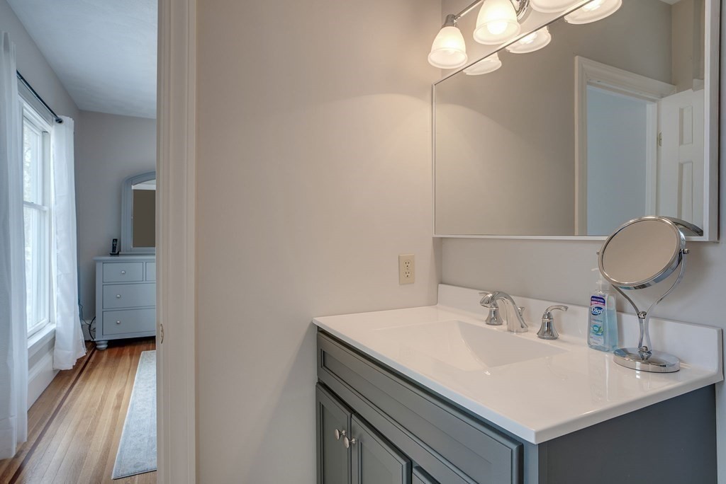 349 Boston Road Billerica, MA 01821 - Photo 21 of 41 a bathroom with a sink vanity and a mirror