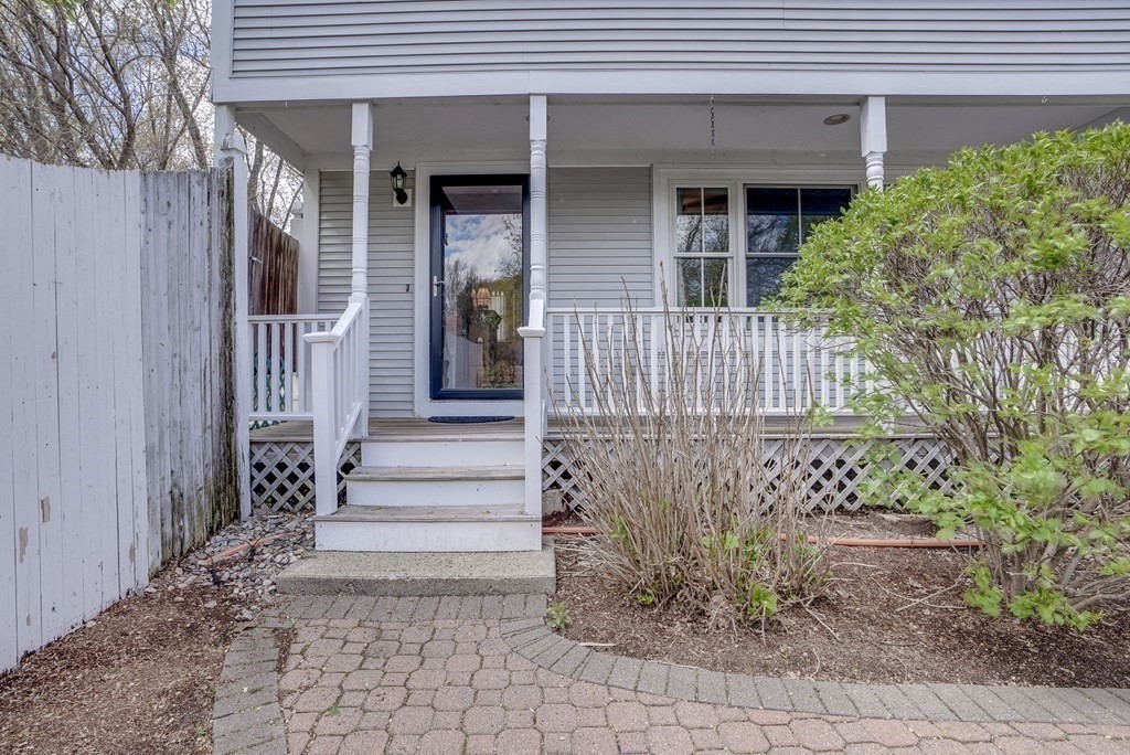 349 Boston Road Billerica, MA 01821 - Photo 24 of 41 a front view of a house with a garden