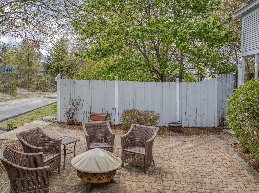349 Boston Road Billerica, MA 01821 - Photo 35 of 41 a backyard of a house with table and chairs