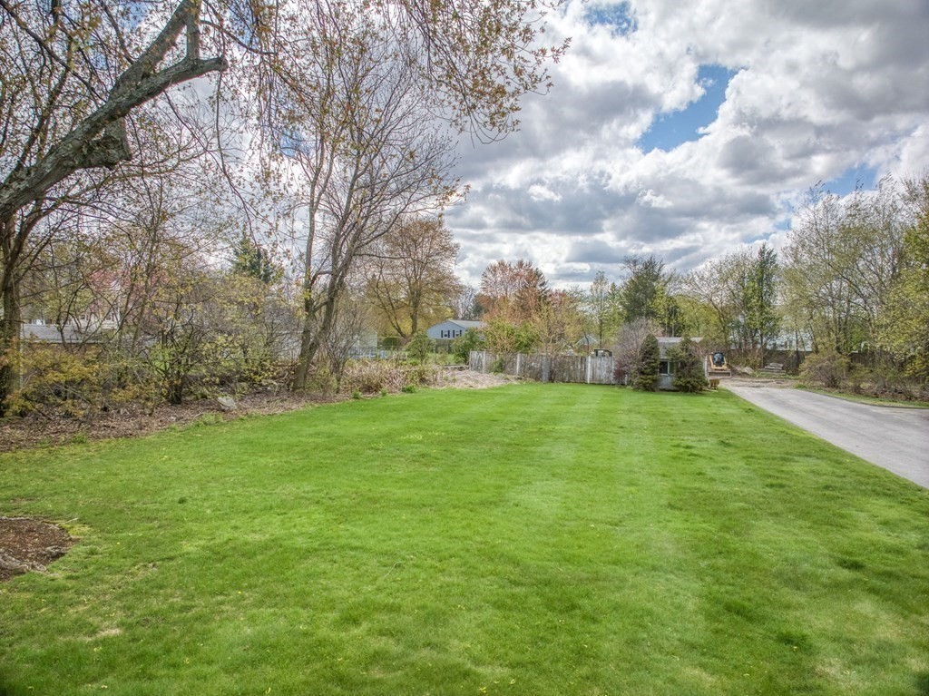 349 Boston Road Billerica, MA 01821 - Photo 37 of 41 a view of a field of grass and trees