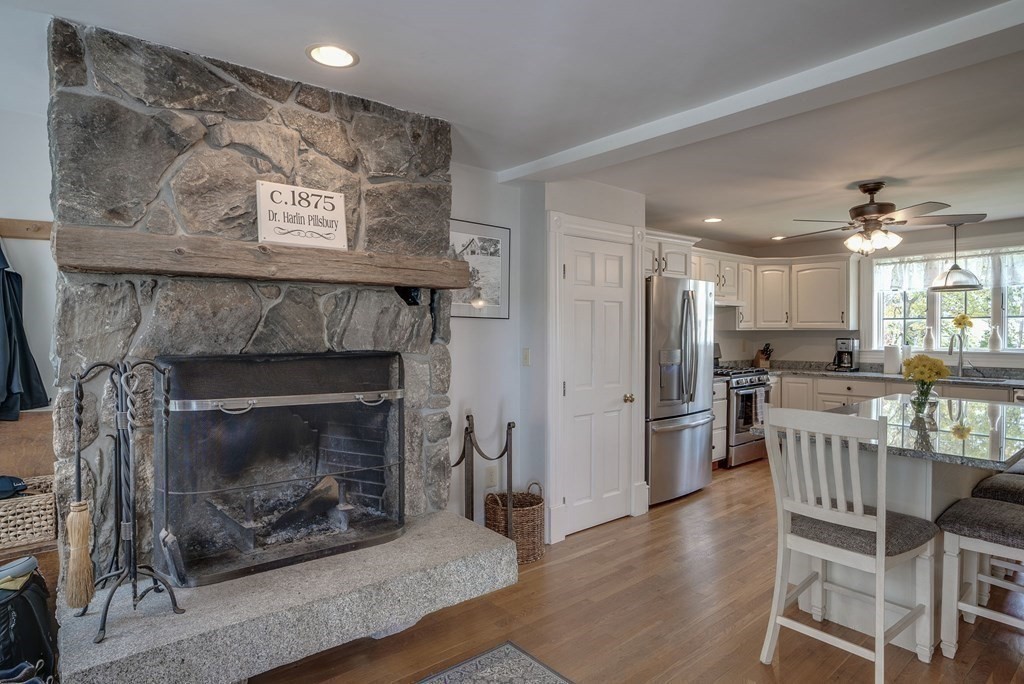 349 Boston Road Billerica, MA 01821 - Photo 6 of 41 a living room with furniture and a fireplace