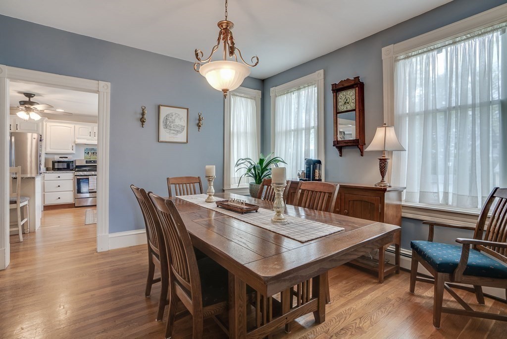 349 Boston Road Billerica, MA 01821 - Photo 7 of 41 a view of a dining room with furniture and wooden floor