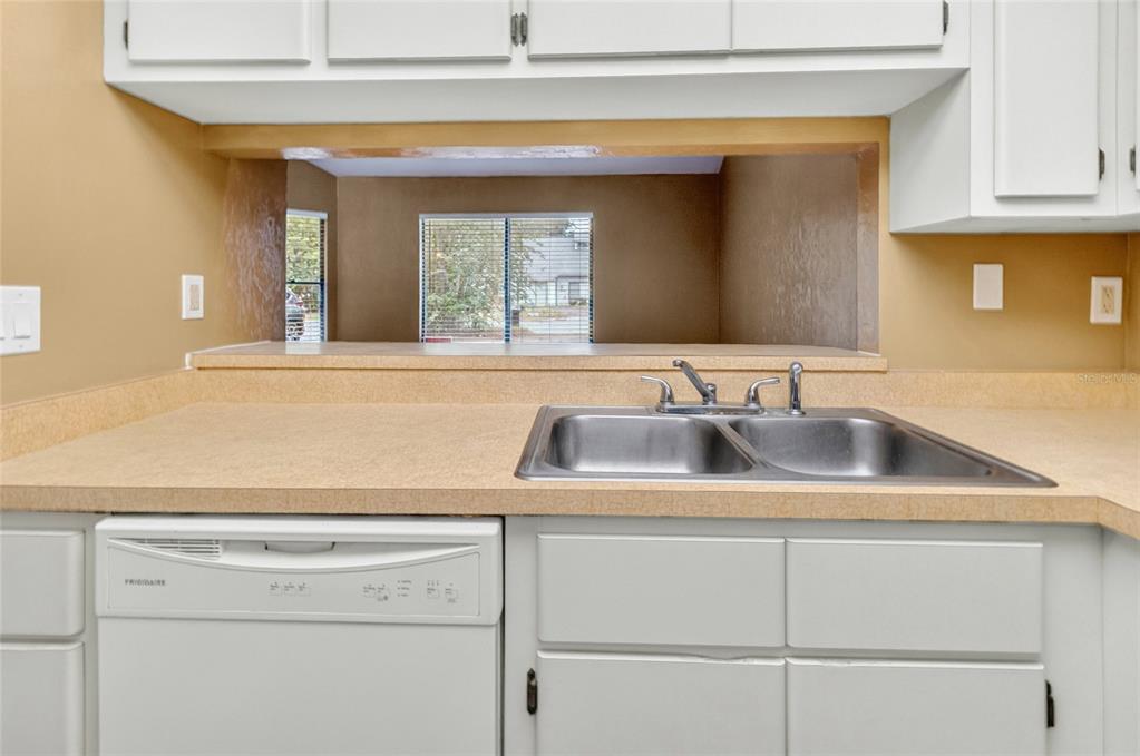 2941 Southwest 39th Avenue Gainesville, FL 32608 - Photo 12 of 39 a close view of sink and tap