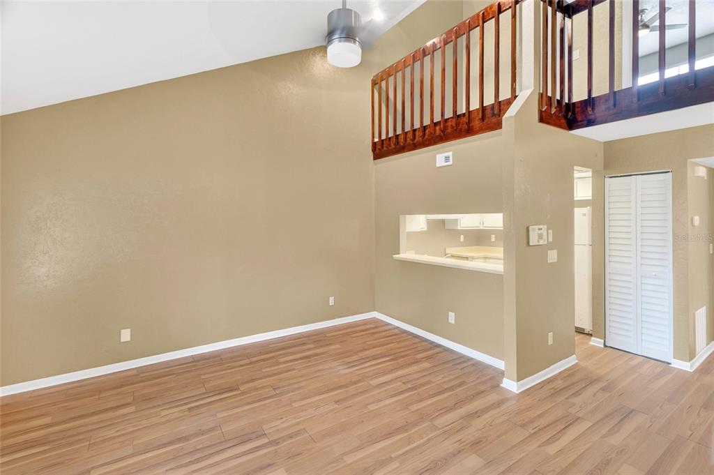 2941 Southwest 39th Avenue Gainesville, FL 32608 - Photo 6 of 39 wooden floor in an empty room
