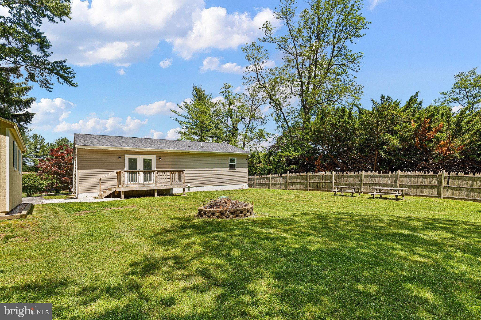 370 Big Elk Chapel Road Elkton, MD 21921 - Photo 23 of 29 a view of a house with backyard and trees