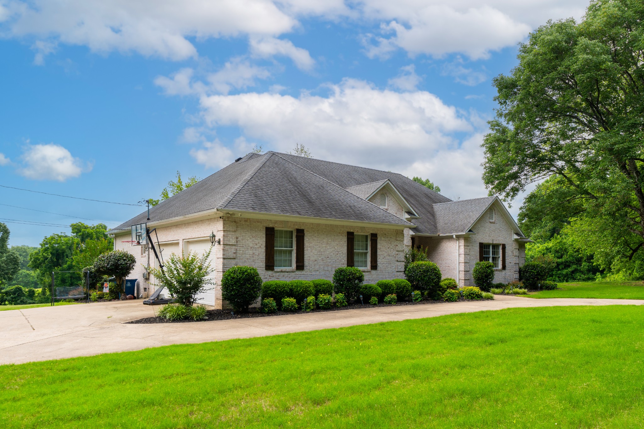 1015 Kelly Road Dyersburg, TN 38024 - Photo 2 of 41 a front view of house with yard and green space