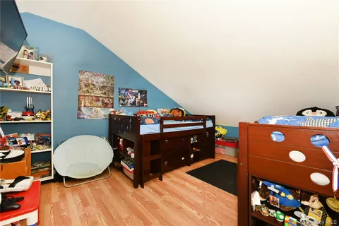 a room with furniture and a chair