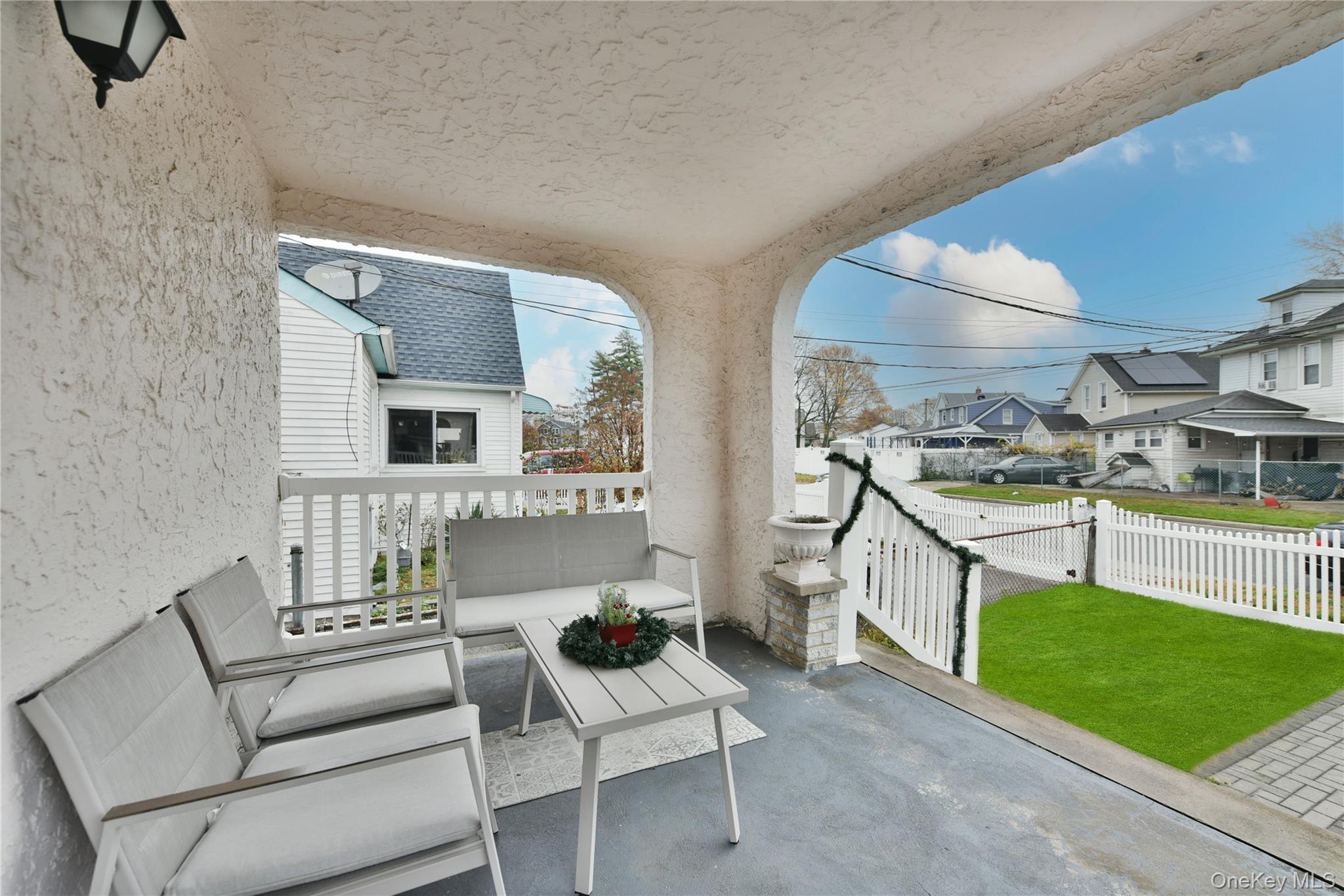 113 Stewart Avenue Hempstead, NY 11550 - Photo 4 of 30 a living room with furniture and a garden