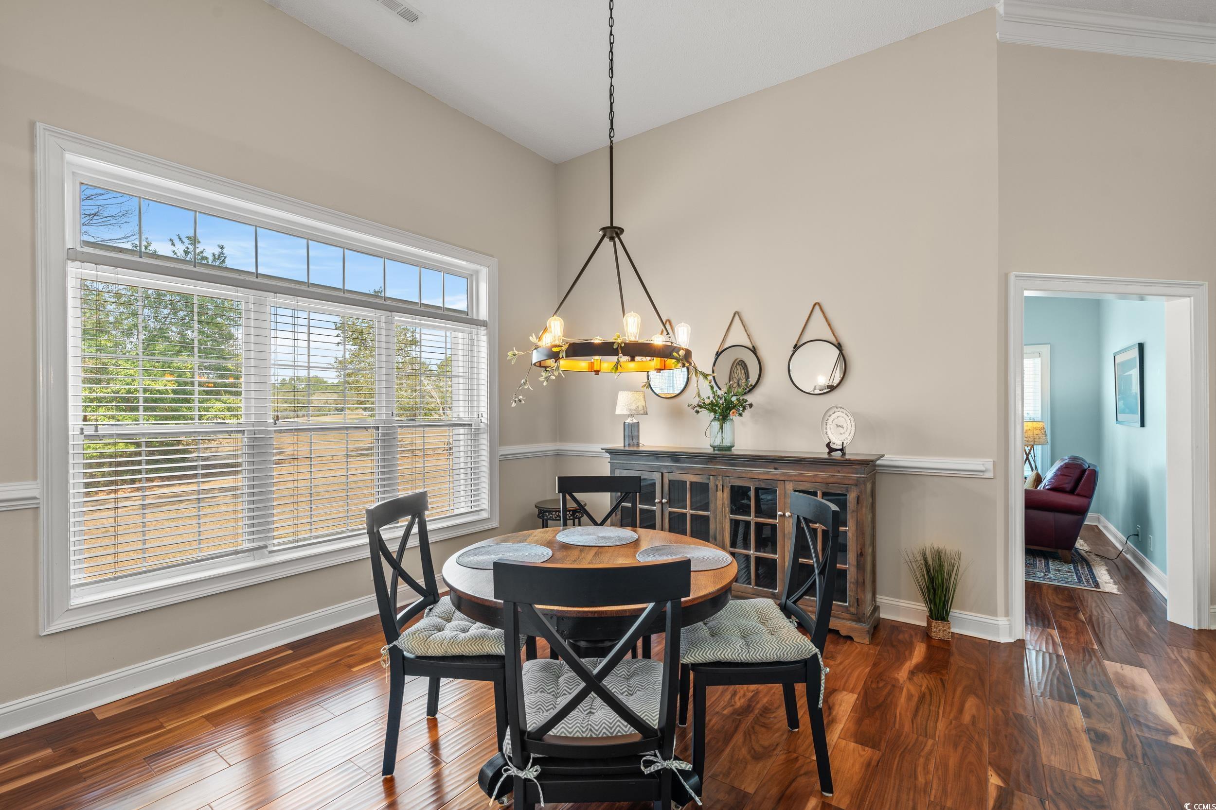 30 Baldwin Loop Pawleys Island, SC 29585 - Photo 11 of 39 Dining space with baseboards, dark wood finished f