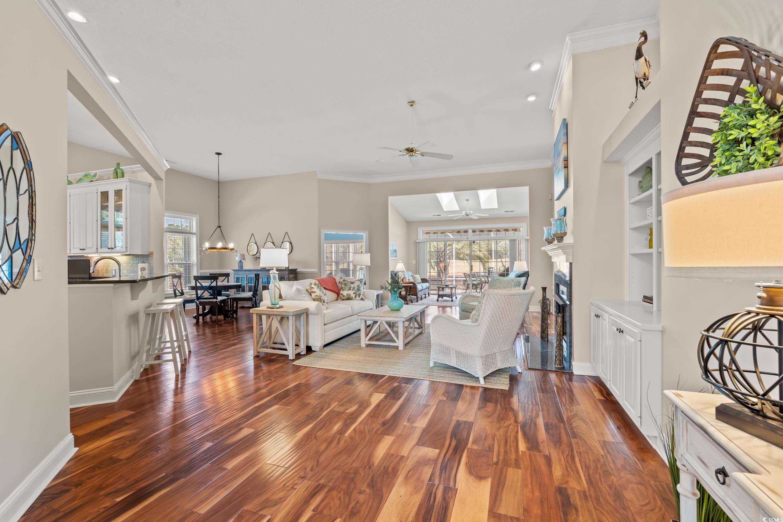 30 Baldwin Loop Pawleys Island, SC 29585 - Photo 15 of 39 Living area featuring a wealth of natural light, o