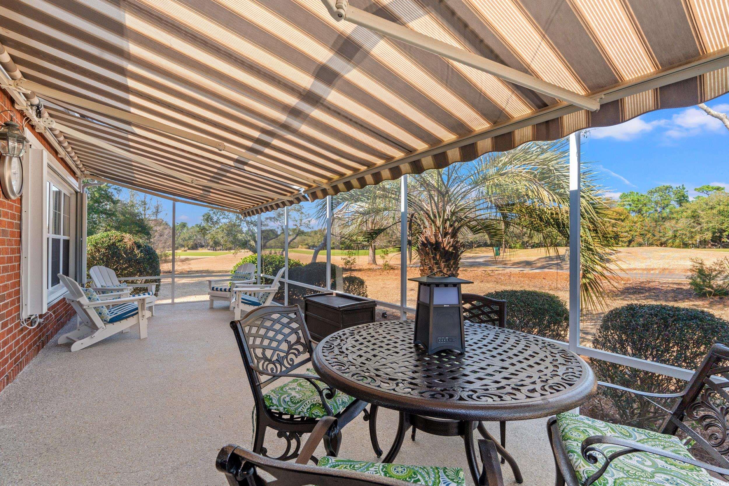30 Baldwin Loop Pawleys Island, SC 29585 - Photo 20 of 39 View of patio featuring outdoor dining area