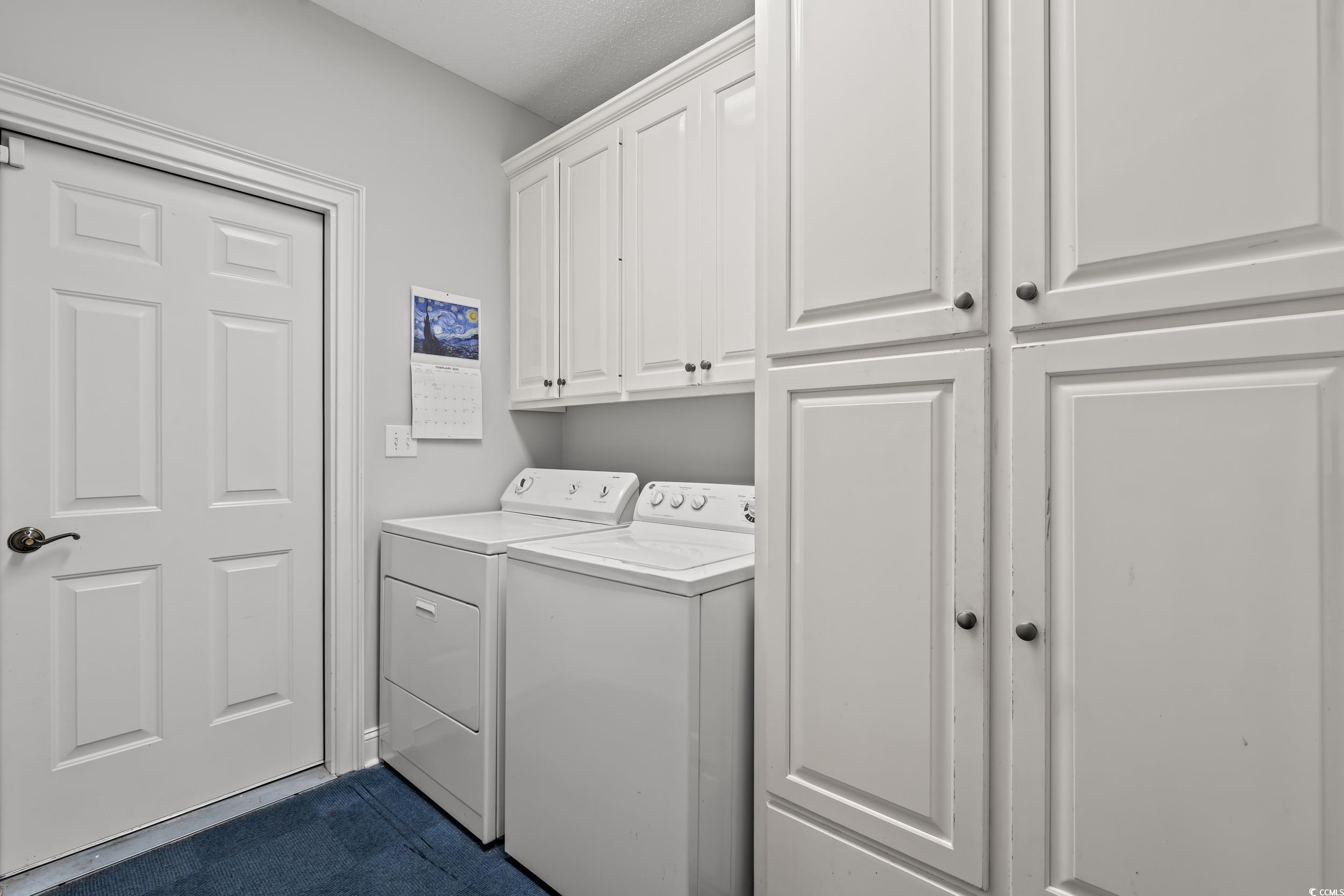 30 Baldwin Loop Pawleys Island, SC 29585 - Photo 31 of 39 Clothes washing area featuring cabinet space and w