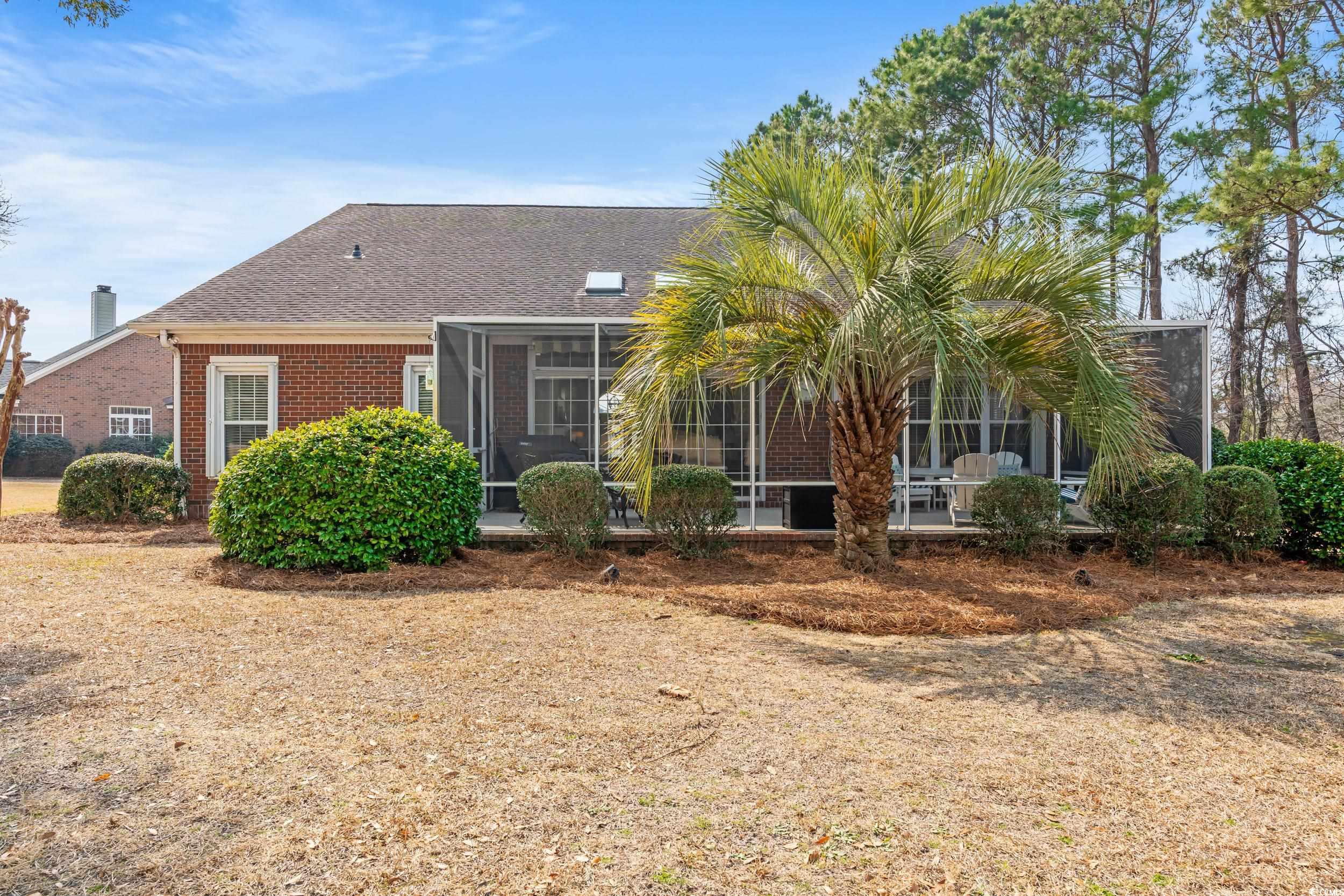 30 Baldwin Loop Pawleys Island, SC 29585 - Photo 32 of 39 View of front of property featuring a sunroom, bri